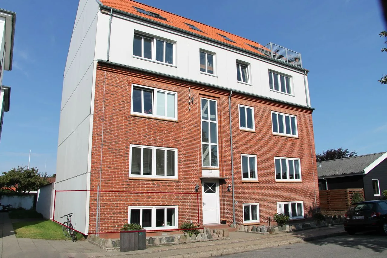 Fin kælderlejlighed på 60 m²